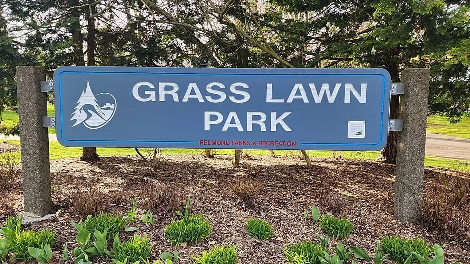 Entrance sign and trees at Grass Lawn Park in Redmond